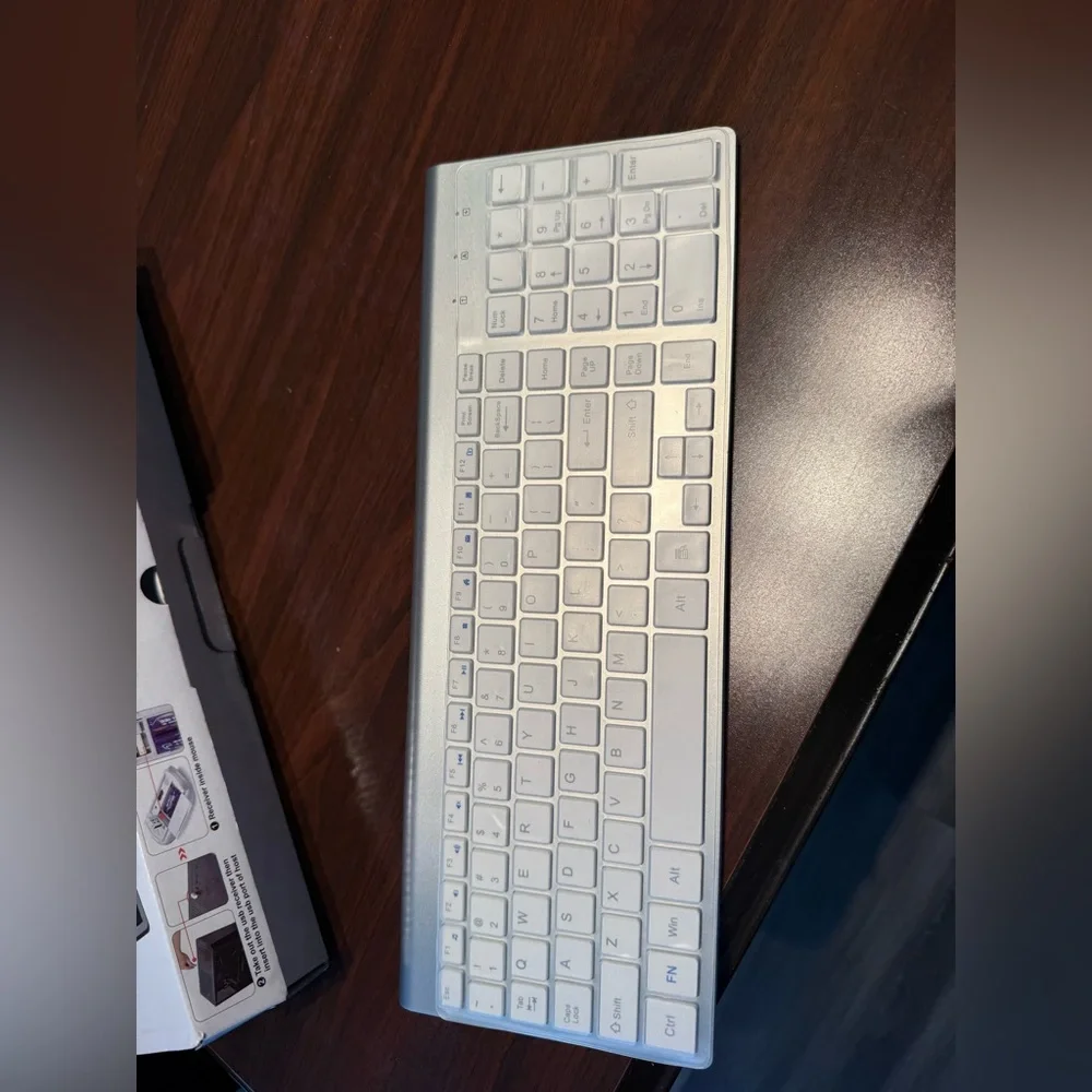 Sleek Silver Wireless Keyboard with mouse